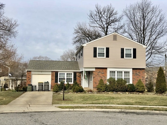 house after asbestos siding removal