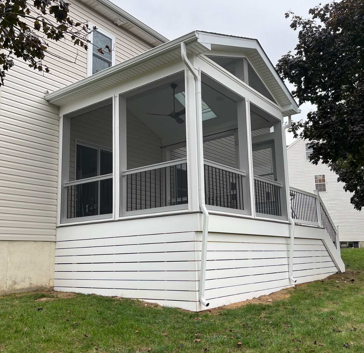 Completed covered deck addition attached to the home